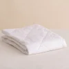 The Sleep Store Quilted Wool Topper - Drift Travel Cot